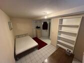Foto - Charmante 1-Zimmer-Souterrainwohnung mit Küchenzeile und Bad