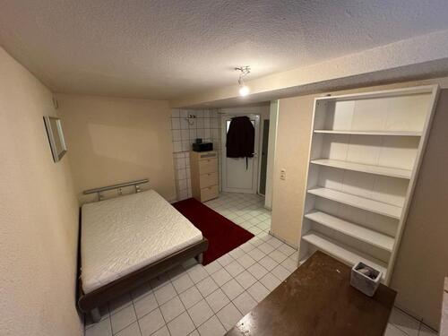 Foto - Charmante 1-Zimmer-Souterrainwohnung mit Küchenzeile und Bad