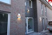 Foto - Neubau- Erdgeschosswohnung mit drei Zimmern in zentraler Lage von Esens