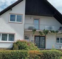 Ein-ein halb stöckiges Einfamilienhaus in HeusweilerHolz zu verk