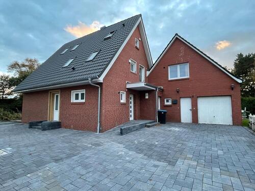 Foto - Modernes Wohnen mit Komfort und Stil – sanierte Wohnung mit großem Grundstück