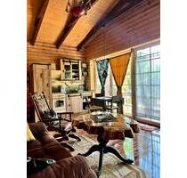 Urlaub am Ruppiner See bei Neuruppin . Rustikale Ferienhäuser