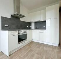 2-Zimmer-Wohnung mit Südwest-Balkon, Stellplatz & moderner Einbauküche - Papendorf