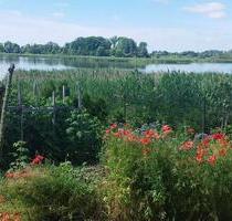 Charmantes Doppelhaus mit großem Seegrundstück und Steg zum See - Penkun