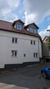 Foto - Mehrfamilienhaus im erweiterten Rohbau