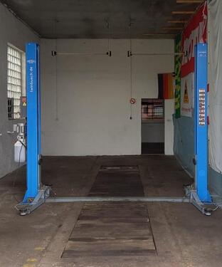 Foto - Garage Lager Werkstatt mit Hebebühne 4,20 m Hallenhöhe