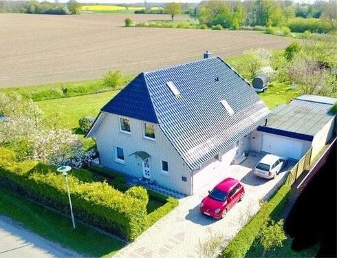 Foto - Haus kaufen Einliegerwohnung Stockelsdorf Obernwohlde am Feldrand