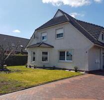 Gepflegtes Zweifamilienhaus mit Garage und Garten in Moordorf - Südbrookmerland