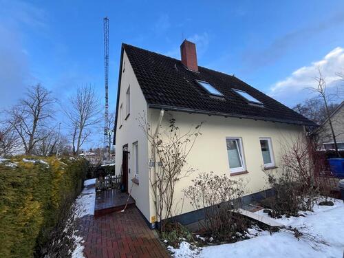 Foto - Ein-Zweifamilienhaus mit Bootssteg an der Wörpe