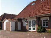 Foto - Ferienwohnung HooksielNordsee mit Strandkorb am Sandstrand