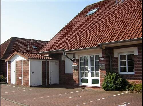 Foto - Ferienwohnung HooksielNordsee mit Strandkorb am Sandstrand