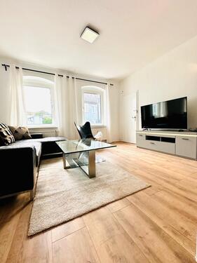 Foto - Exklusives Wohnen auf Zeit: Stilvolle Parterre-Wohnung mit luxuriösen Details und zentraler Lage