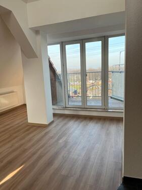 Foto - Lichtdurchflutete Maisonette Wohnung mit Balkon und Parkblick