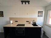 Foto - Schöne kleine Dachgeschosswohnung