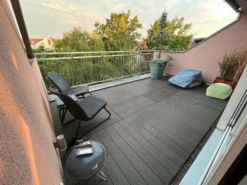 Foto - Dachgeschoss mit Terrasse und Kaminofen