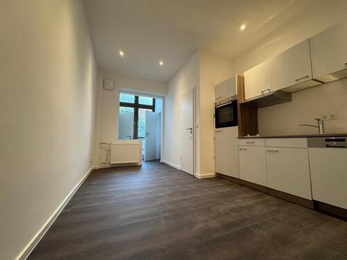 Foto - Modernisierte 1,5-Zimmer-Wohnung Einbauküche Gemeinschaftsgarten