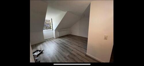 Foto - Charmante, sanierte 2-Zimmer-Dachgeschosswohnung mit Garten