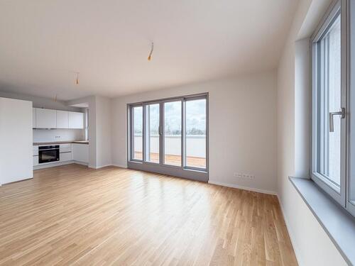 Foto - Penthouse-Wohnung mit Dachterrasse über Eck, Gäste WC, Tiefgaragenstellplatz und offener Einbauküche