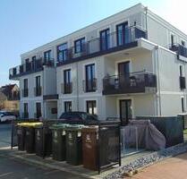 Sonnige Neubau Wohnung 2 Zimmer, Einbauküche, Balkon, Stellplatz - Fuldatal