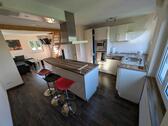Foto - 3 - Zimmer Wohnung mit Garage, Carport und Garten