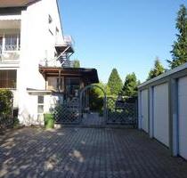 Haus mit 3 Wohnungen und 4 Garagen zu verkaufen! - Tegernheim