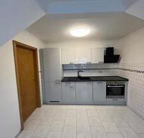 zentrumsnahe Dachgeschosswohnung mit neuer Einbauküche - Osterburg (Altmark)