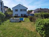 Foto - 1 Familienhaus freistehend mit Terrasse, Garten, Pool und Garage.