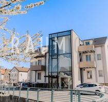 Exklusive 3-Zimmer-Dachgeschosswohnung in Bad Staffelstein mit Aufzug, Balkon & Designküche