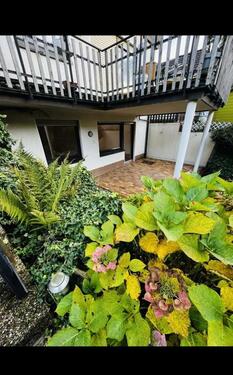 Foto - Single-Wohnung im Souterrain mit großer Terrasse