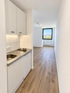 Foto - Renoviertes 1-Zimmer-Apartment mit 2 Tiefgaragenstellplätzen