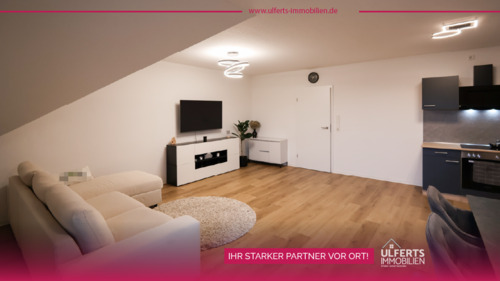 Foto - Neuwertige Dachgeschosswohnung mit Aufzug und Balkon im Zentrum von Warsingsfehn