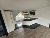 Foto - Moderne 2-Zimmer-Dachgeschosswohnung mit Wintergarten & Garten