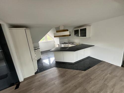 Foto - Moderne 2-Zimmer-Dachgeschosswohnung mit Wintergarten & Garten