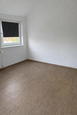 Foto - Helle 3-Zimmer-DG-Wohnung mit Einbauküche in Kreiensen – 55 m²