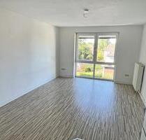 Moderne 3 Zimmer-Maisonette-Wohnung mit Einbauküche, überdachtem Süd-Westbalkon und PKW-Stellplatz in Bad Oeynhausen-Rehme