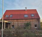 Foto - Massivholzhaus mit Lärchenverschalung zu verkaufen