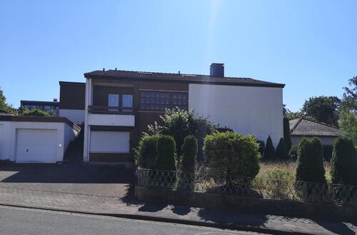Foto - Einfamilienhaus mit einer Einliegerwohnung