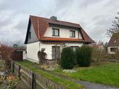 Foto - Einfamilienhaus mit Garage und Nebengelass