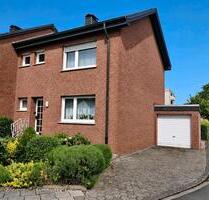 Reihenendhaus mit Garten, PV und 2 Garagen in Oelde-Nord 409 m2