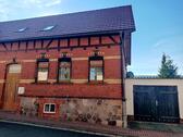 Foto - Doppelhaushälfte (Einfamilienhaus) mit Garage und sonnigem Garten