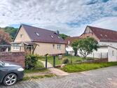 Foto - Haus Einfamilienhaus Mehrfamilienhaus Grundstück Garagen Garten