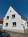 Foto - Einfamilienhaus mit großem Grundstück, Keller und zwei Garagen