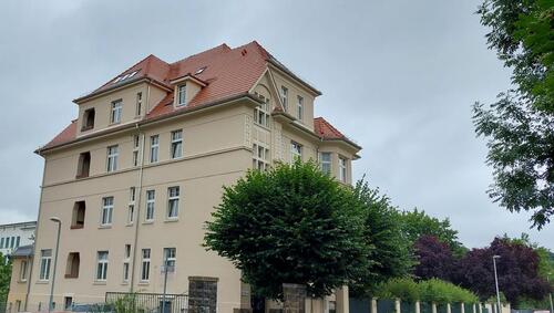 Foto - Mehrfamilienhaus mit Gewerbeeinheit und 7 Garagen