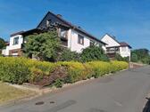 Foto - Einfamilienhaus mit Einliegerwohnung