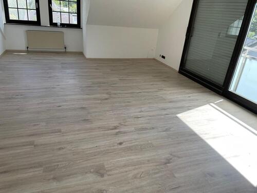 Foto - Moderne Dachgeschosswohnung mit Garten