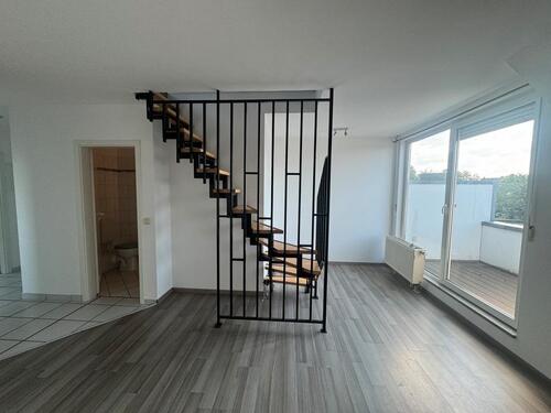 Foto - 3-Zimmer-Wohnung mit zusätzlichem Dachgeschossraum und Balkon.