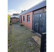 Lübbecke...Charmanter Reihenendbungalow mit Küche und Garage.