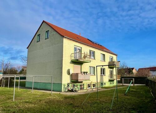 Foto - Erstbezug nach Sanierung - 3-Raumwohnung auf ca. 60 m² mit eigenem Garten, Balkon und Garage