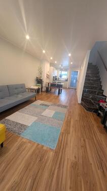 Foto - Reihenmittelhaus mit Garten und Garage zu verkaufen