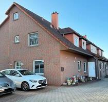 Reihenmittelhaus mit Sonnenterrasse und Balkon in Schortens